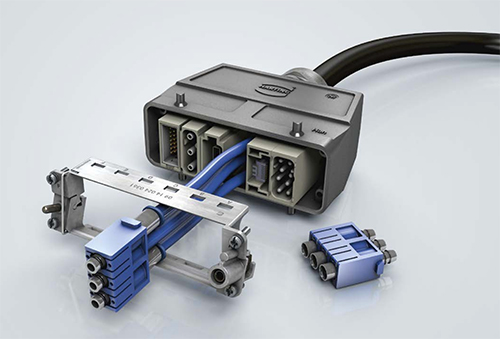 Image of modular connector can handle signals, power, digital communication interfaces, and pneumatics