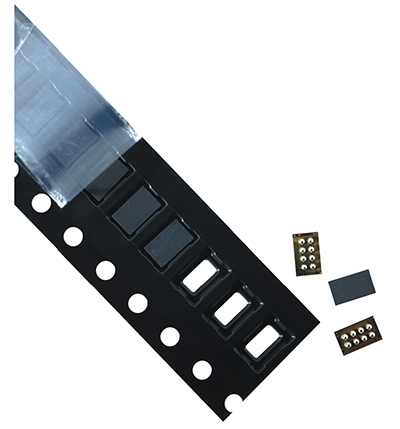 Image of PSA carrier tape (upper left) peeling off a 3000BD conductive polycarbonate precision carrier