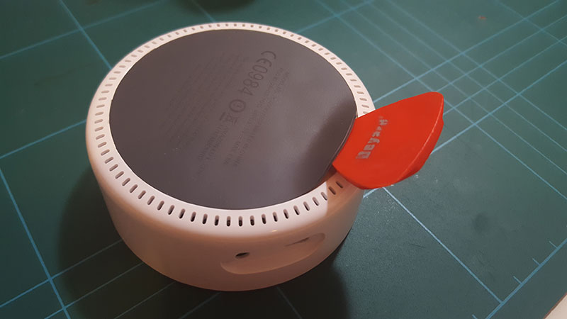 Remove the rubber pad with a pick