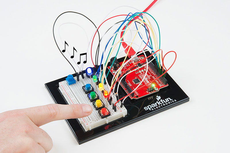 The circuit will flash all the LEDs and play a melody