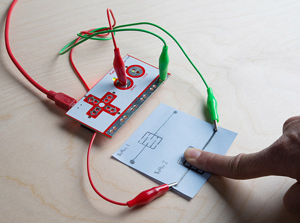 Pressing Down on the Buttons with the Makey Makey