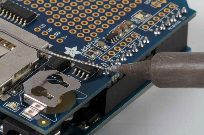 Assembly with male headers