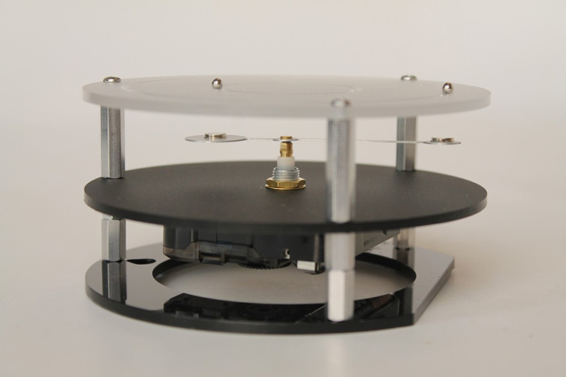 Screw on the top plate using the three screws