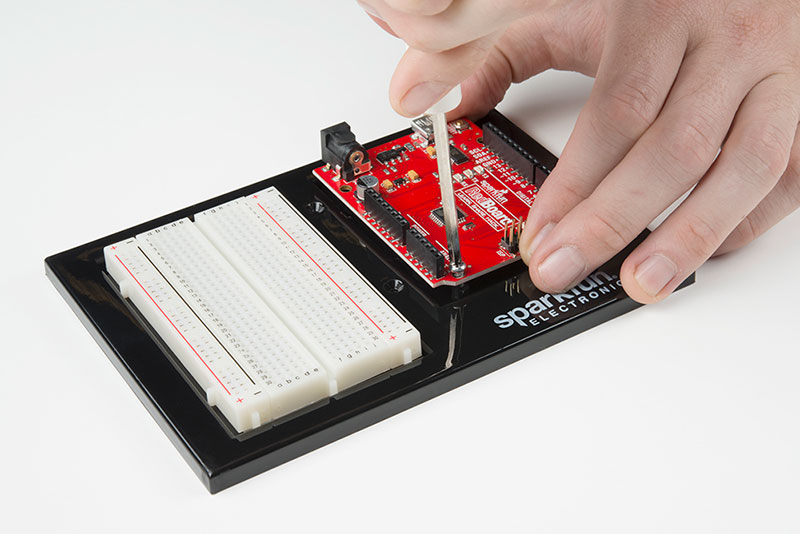 Align the RedBoard with its spot on the baseplate