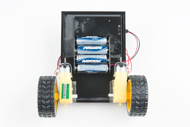 Press the battery holder to the baseplate
