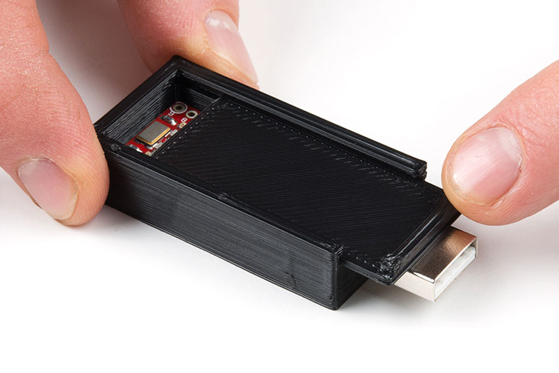 Slide enclosure&rsquo;s top into grooves to cover boards
