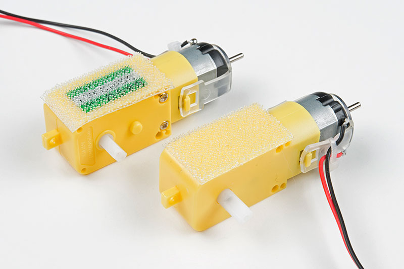 Attach the strips to the two motors